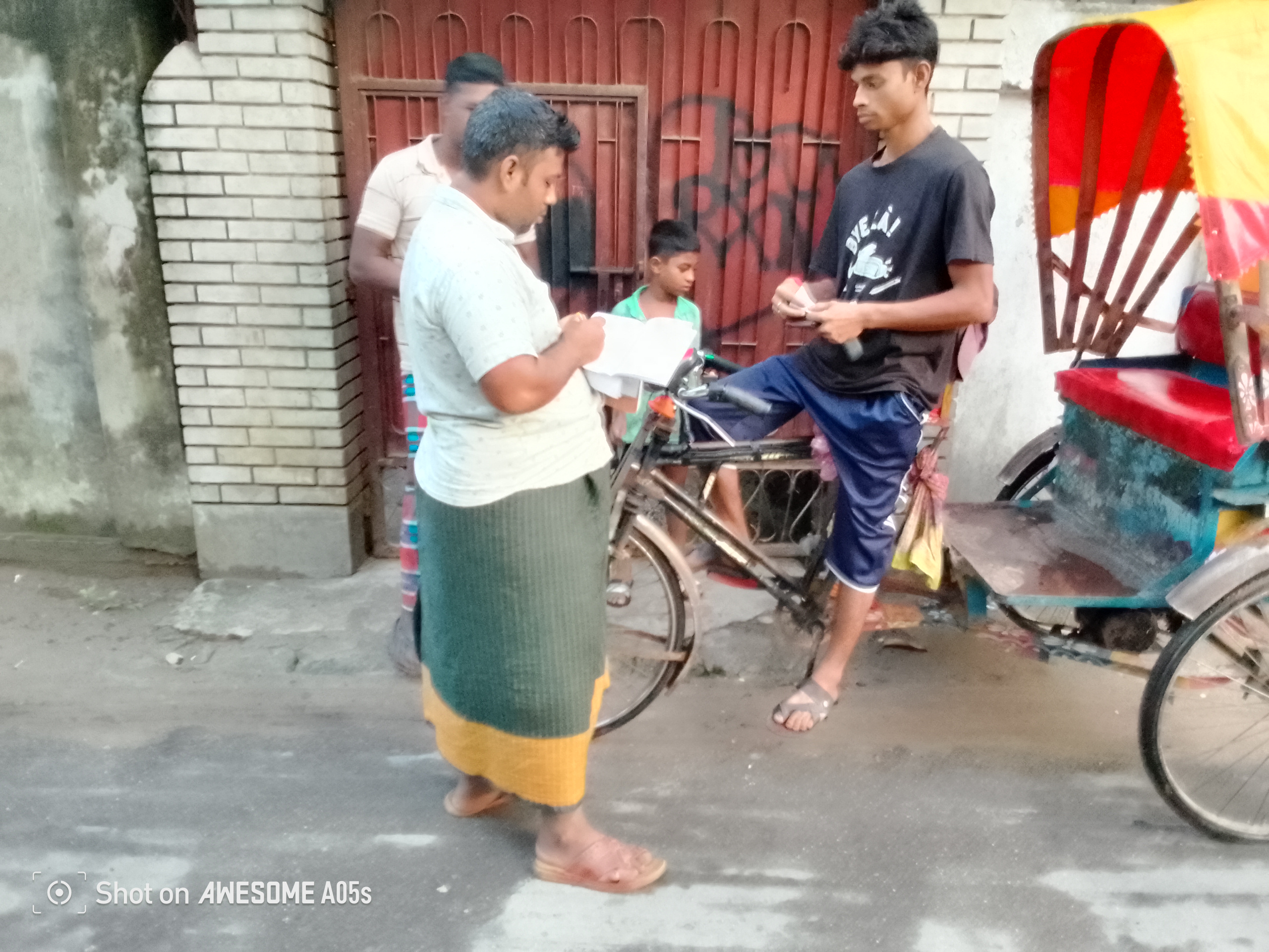 Photovoice Image 8: “A cooperative member also bought a rickshaw with a loan from the cooperative. Our cooperative has given us financial security.